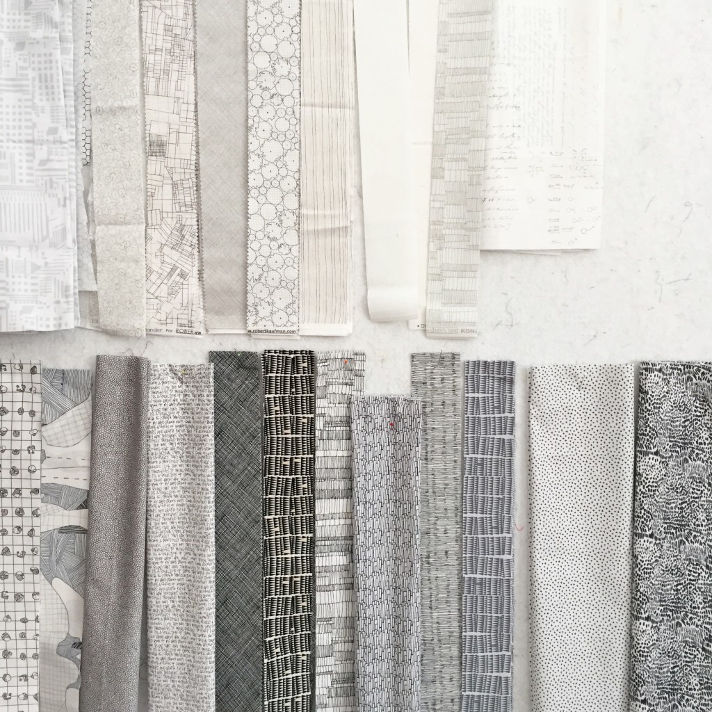 strips of white and gray fabrics